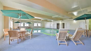 Indoor pool, open 7:00 AM to 10:00 PM, pool umbrellas, pool loungers