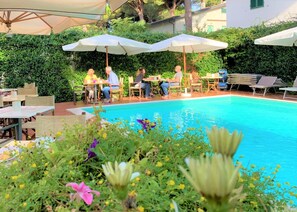 Outdoor pool, pool umbrellas, pool loungers