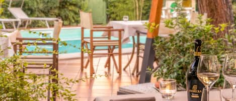 Dinner served, Italian cuisine, pool views