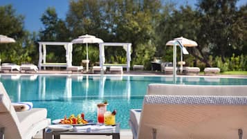 Outdoor pool, pool umbrellas, pool loungers