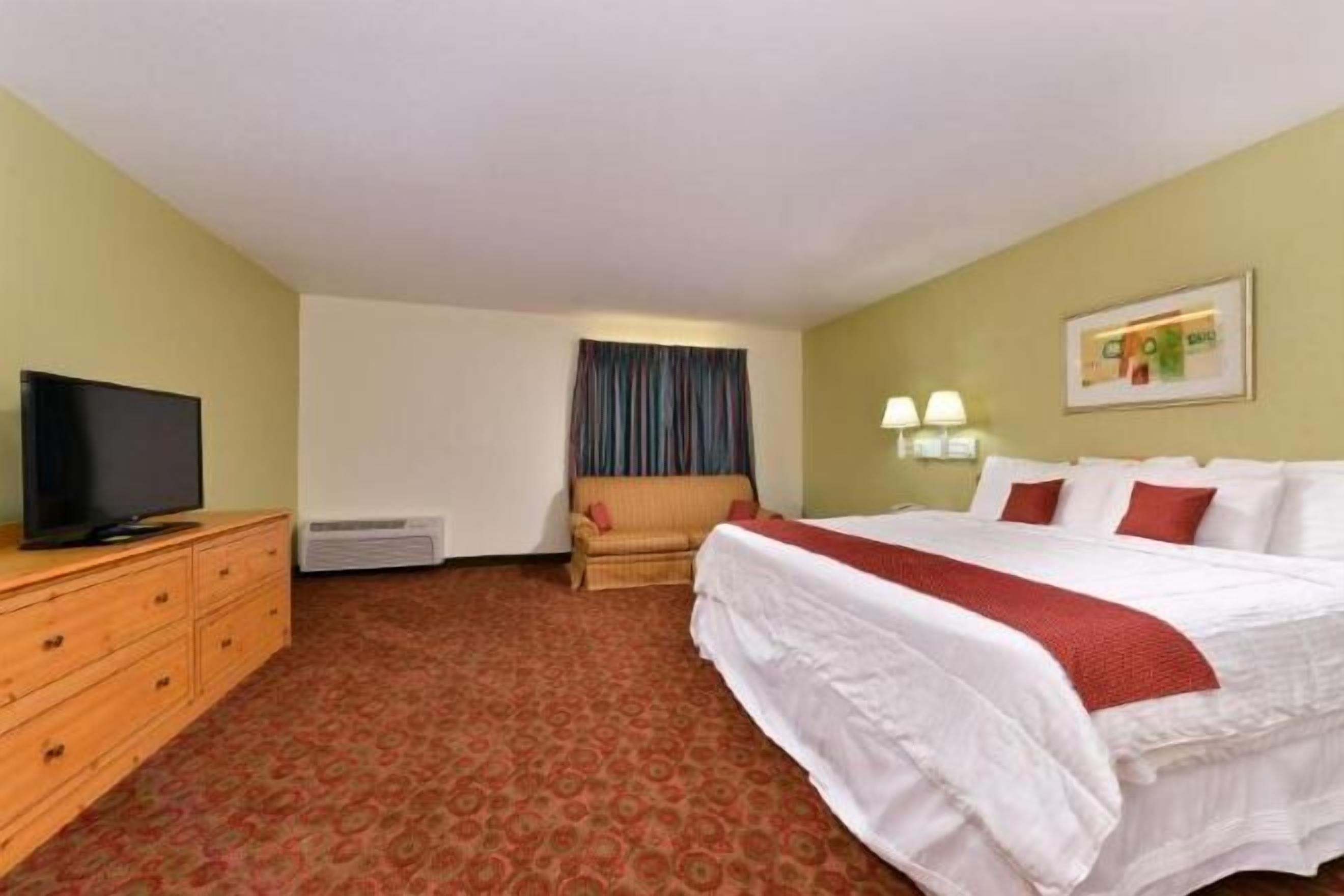 Blackout drapes, iron/ironing board, rollaway beds, free WiFi