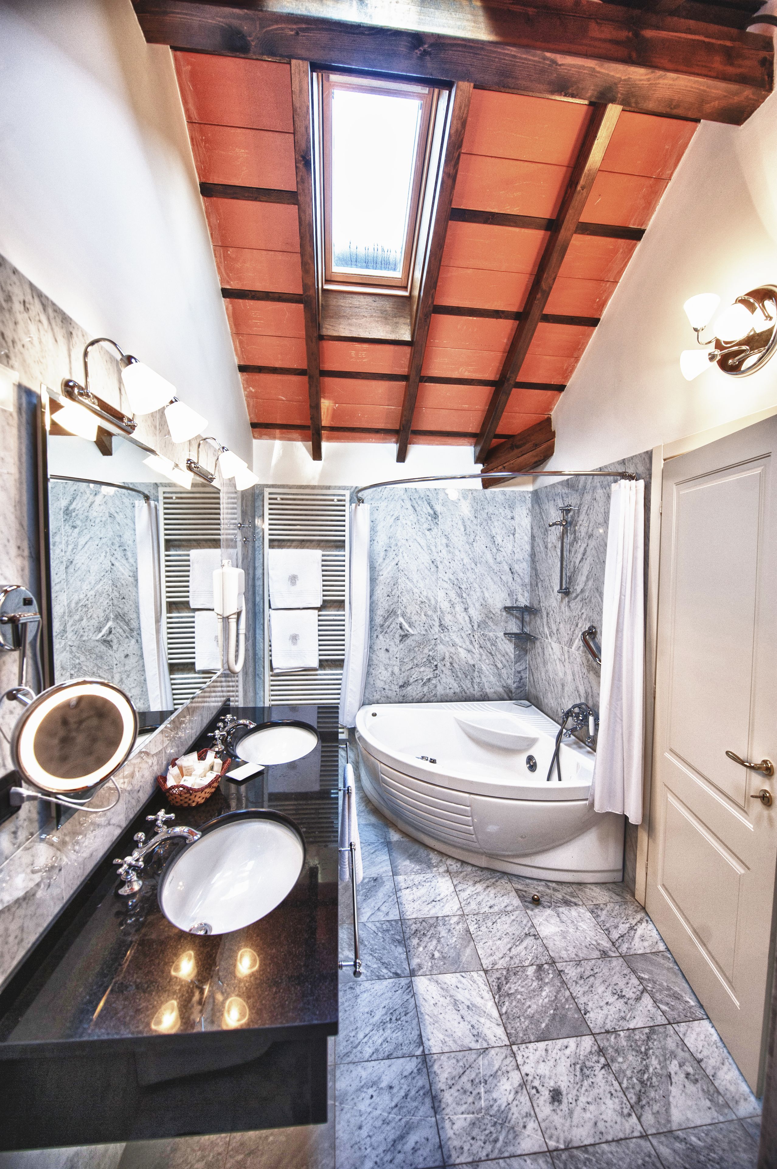 family suite, 1 bedroom, lake view, lakeside | bathroom | designer toiletries, hair dryer, bathrobes, slippers