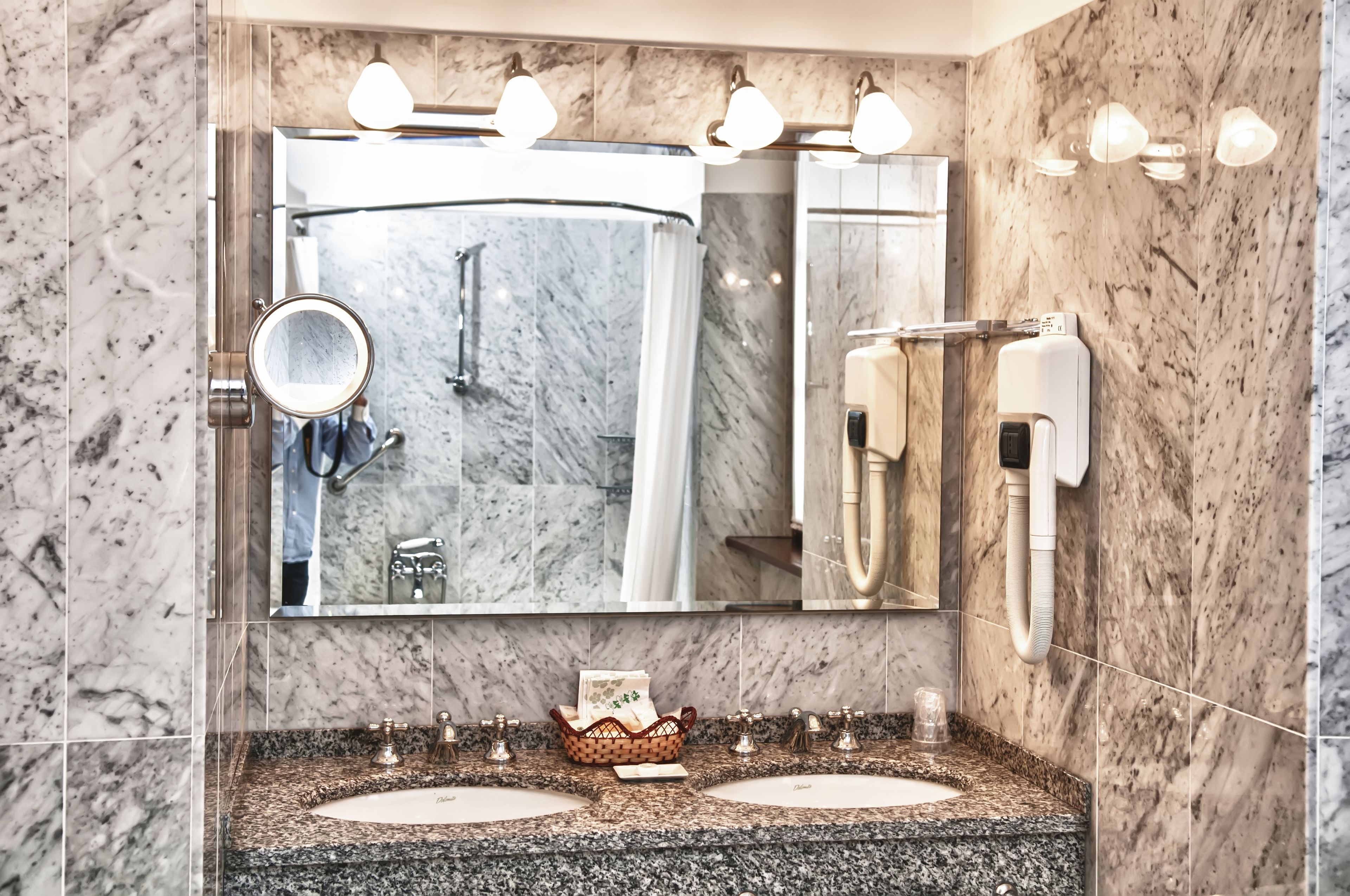 deluxe double or twin room, 1 king bed, lake view | bathroom | designer toiletries, hair dryer, bathrobes, slippers