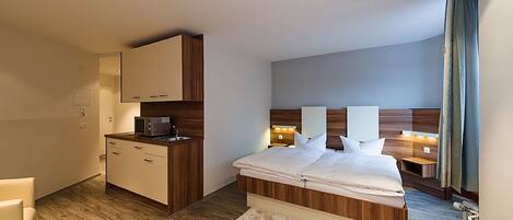 Desk, blackout drapes, iron/ironing board, free WiFi