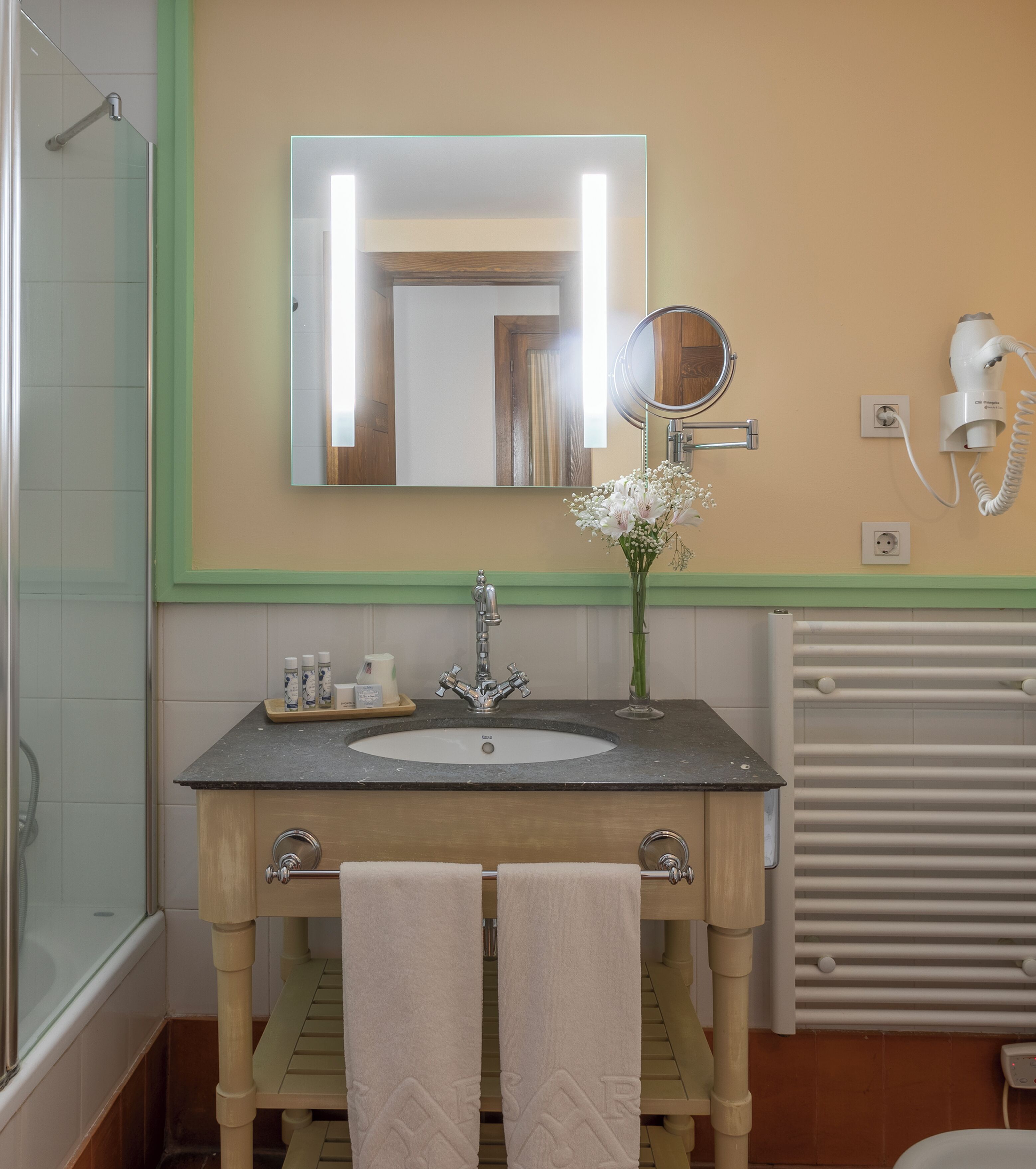 shower, eco-friendly toiletries, hair dryer, towels