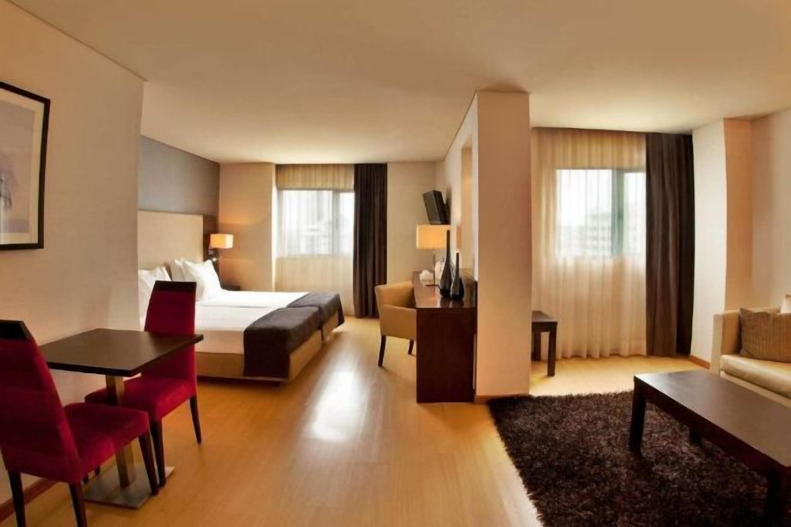 Minibar, caixa forta a l'habitació i cortines opaques 