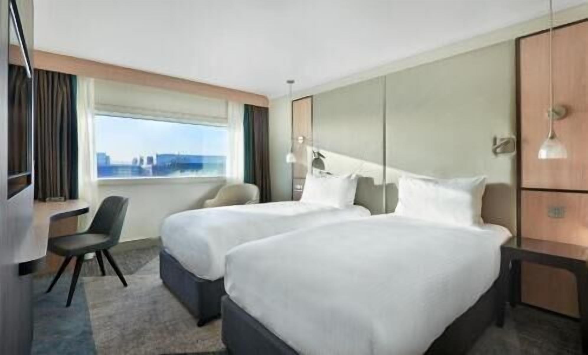 Hypo-allergenic bedding, in-room safe, desk, laptop workspace