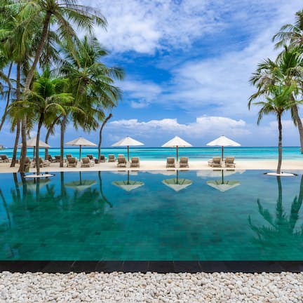 Outdoor pool, open 6:00 AM to 8:00 PM, sun loungers