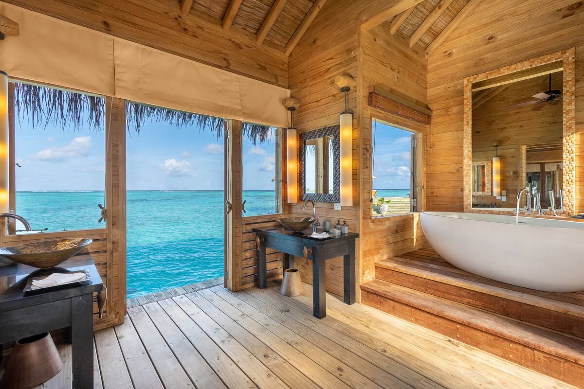 the private reserve | bathroom | separate bathtub and shower, rainfall showerhead, free toiletries