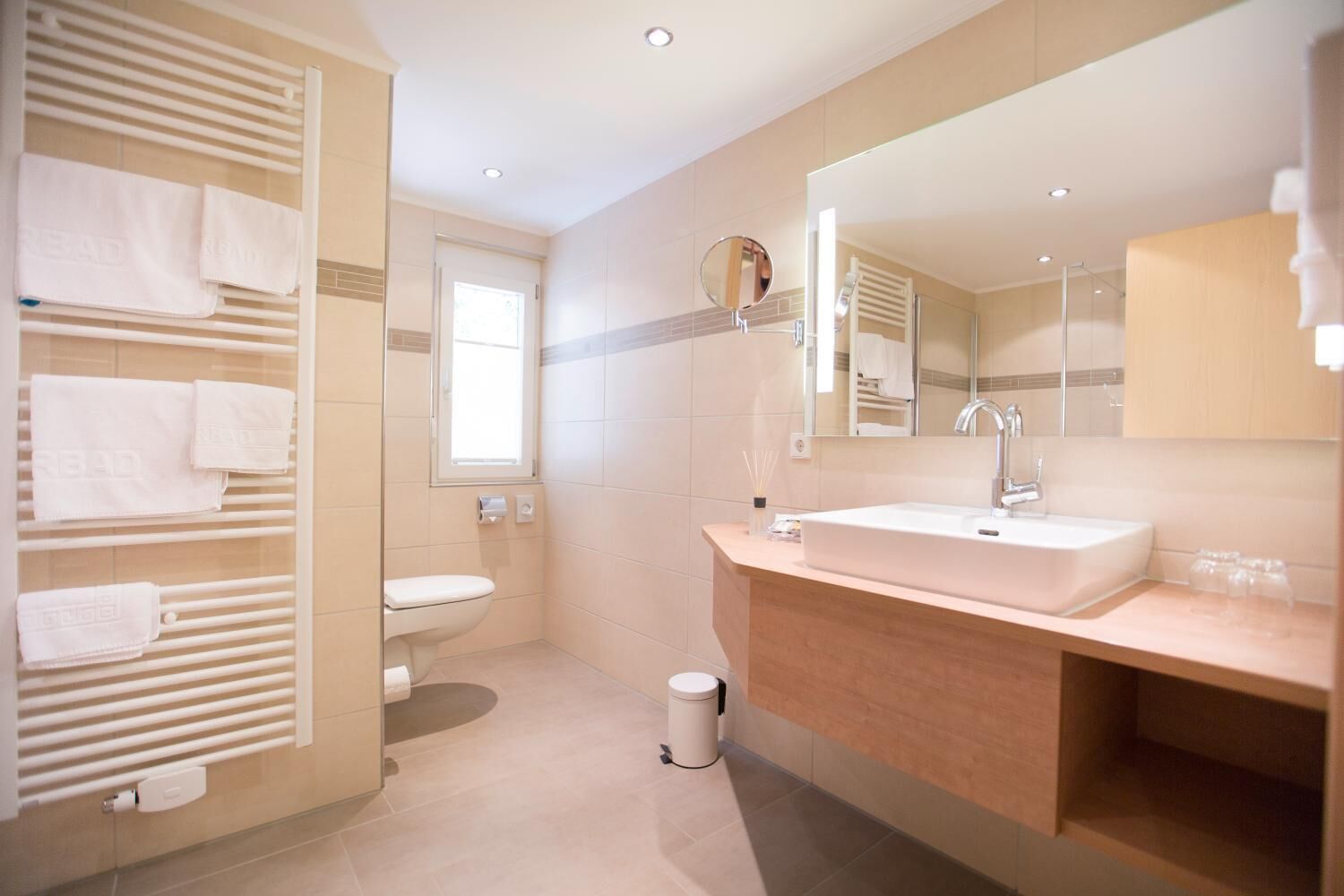 shower, hair dryer, bathrobes, towels