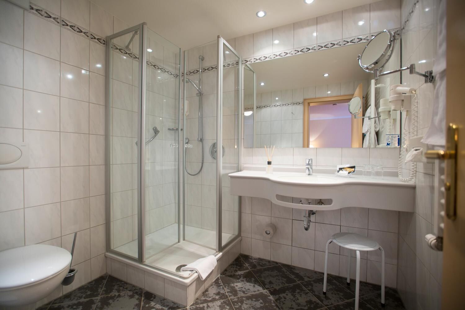 shower, hair dryer, bathrobes, towels