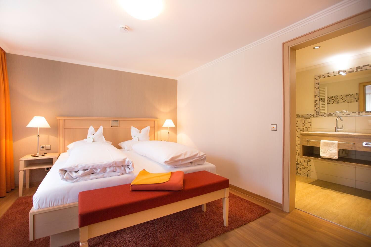 hypo-allergenic bedding, in-room safe, desk, blackout curtains