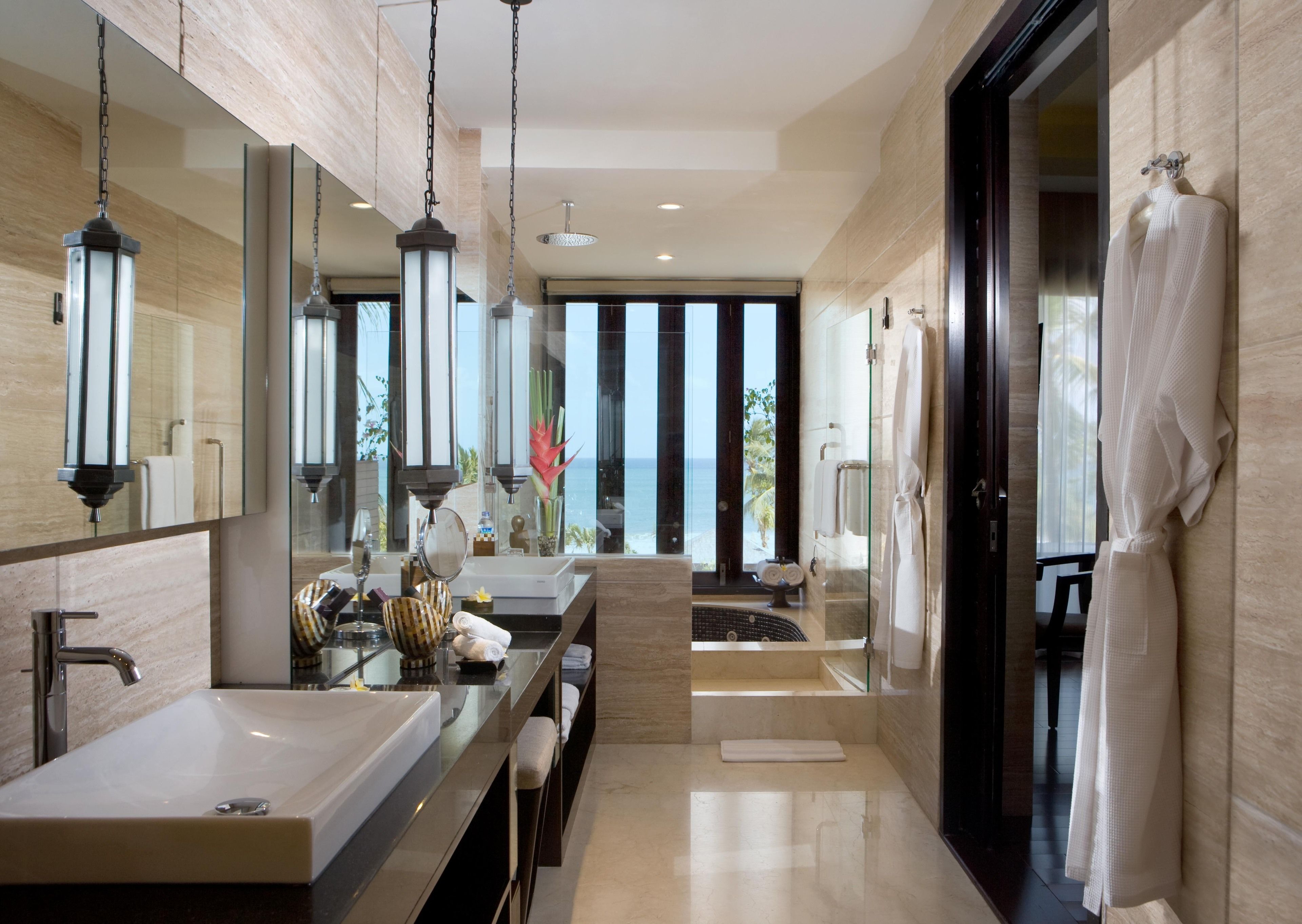 separate bathtub and shower, designer toiletries, hair dryer, bathrobes