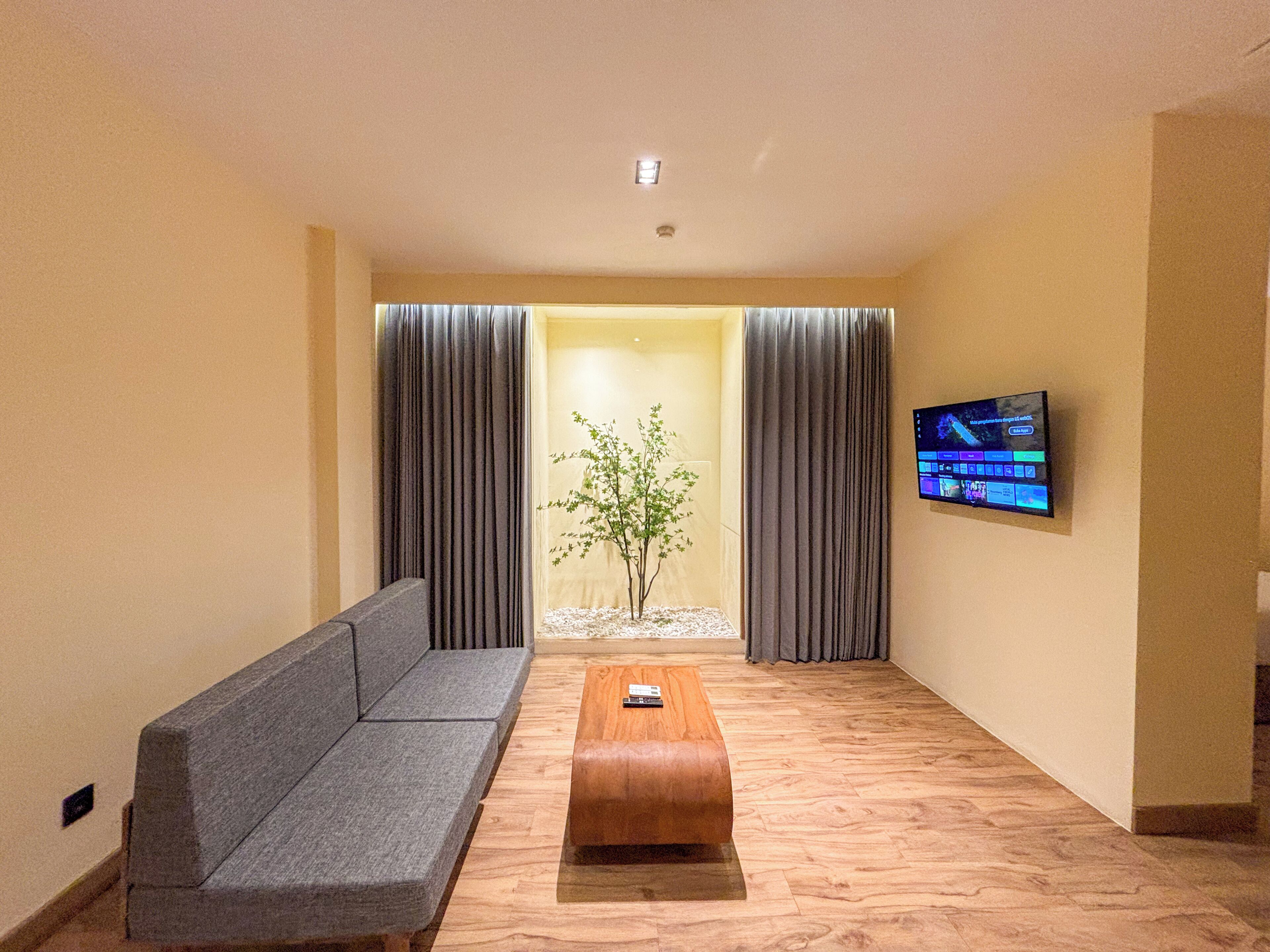 Suite, 1 Bedroom | Living area | 32-inch LCD TV with cable channels, TV