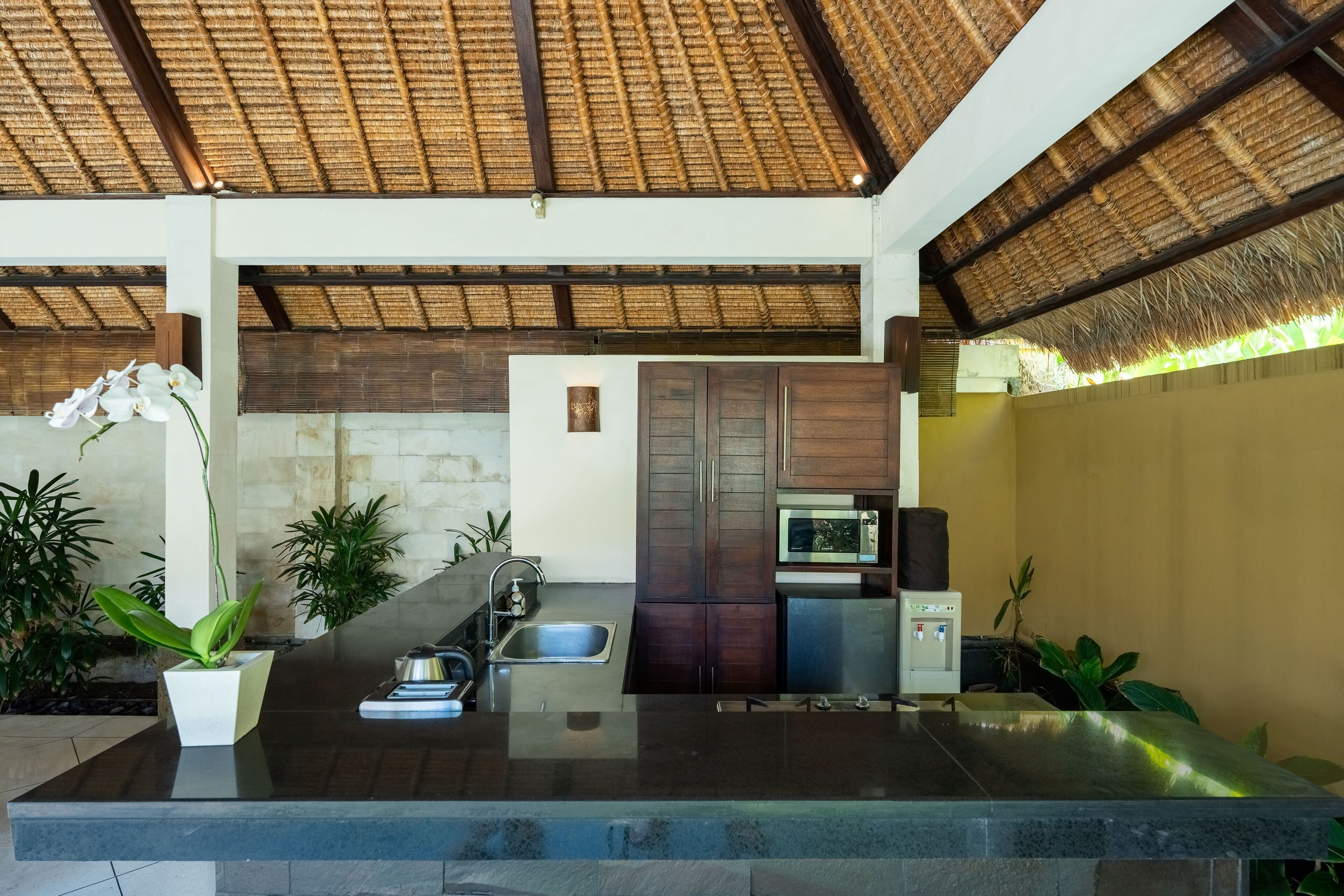 deluxe villa, 2 bedrooms, private pool | private kitchen | fridge, microwave, stovetop, coffee/tea maker
