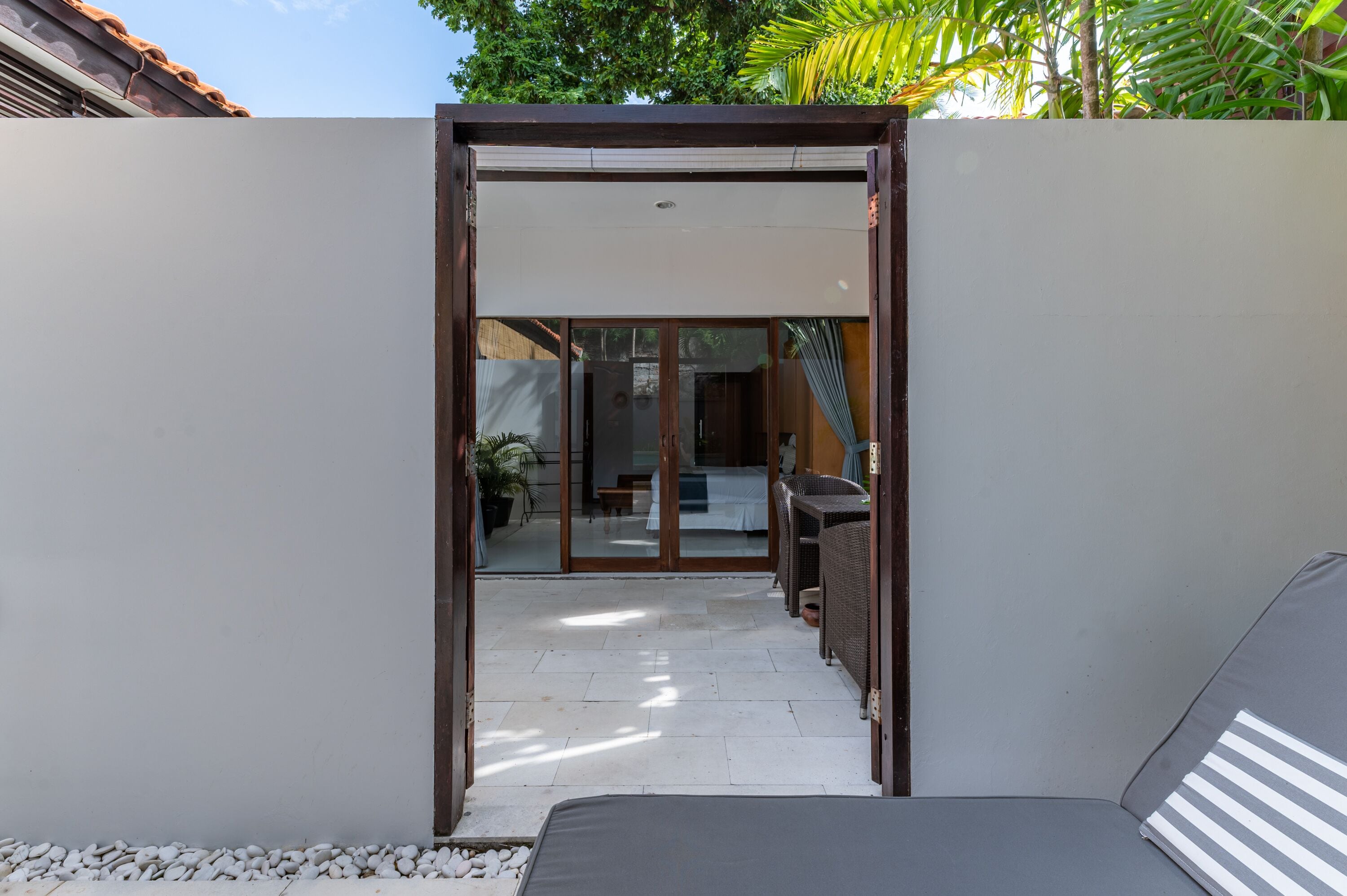 deluxe double room, 2 bedrooms, pool view | living area | 32-inch lcd tv with cable channels, tv, ipod dock