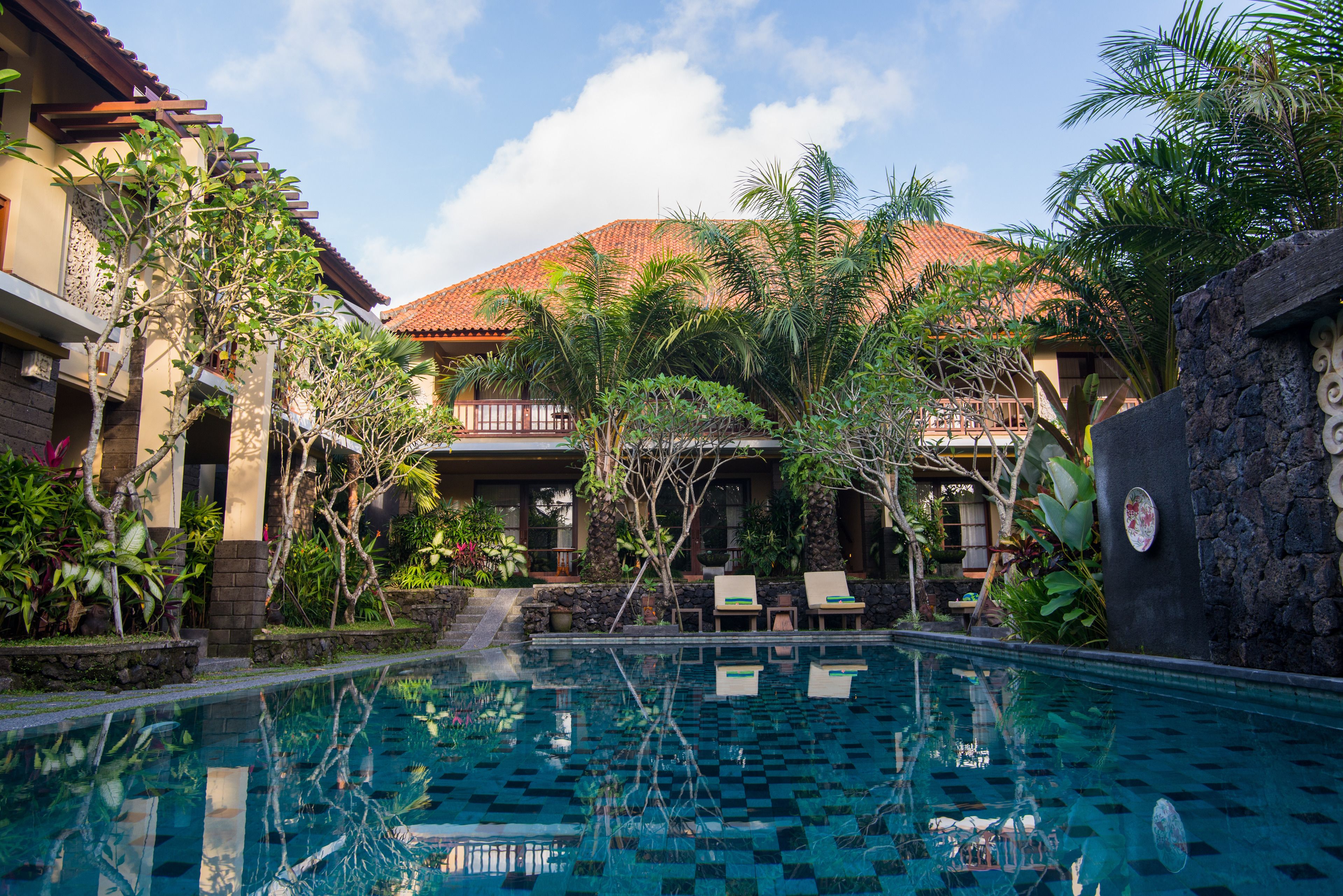 2 outdoor pools, open 7:00 am to 8:00 pm, pool umbrellas, pool loungers