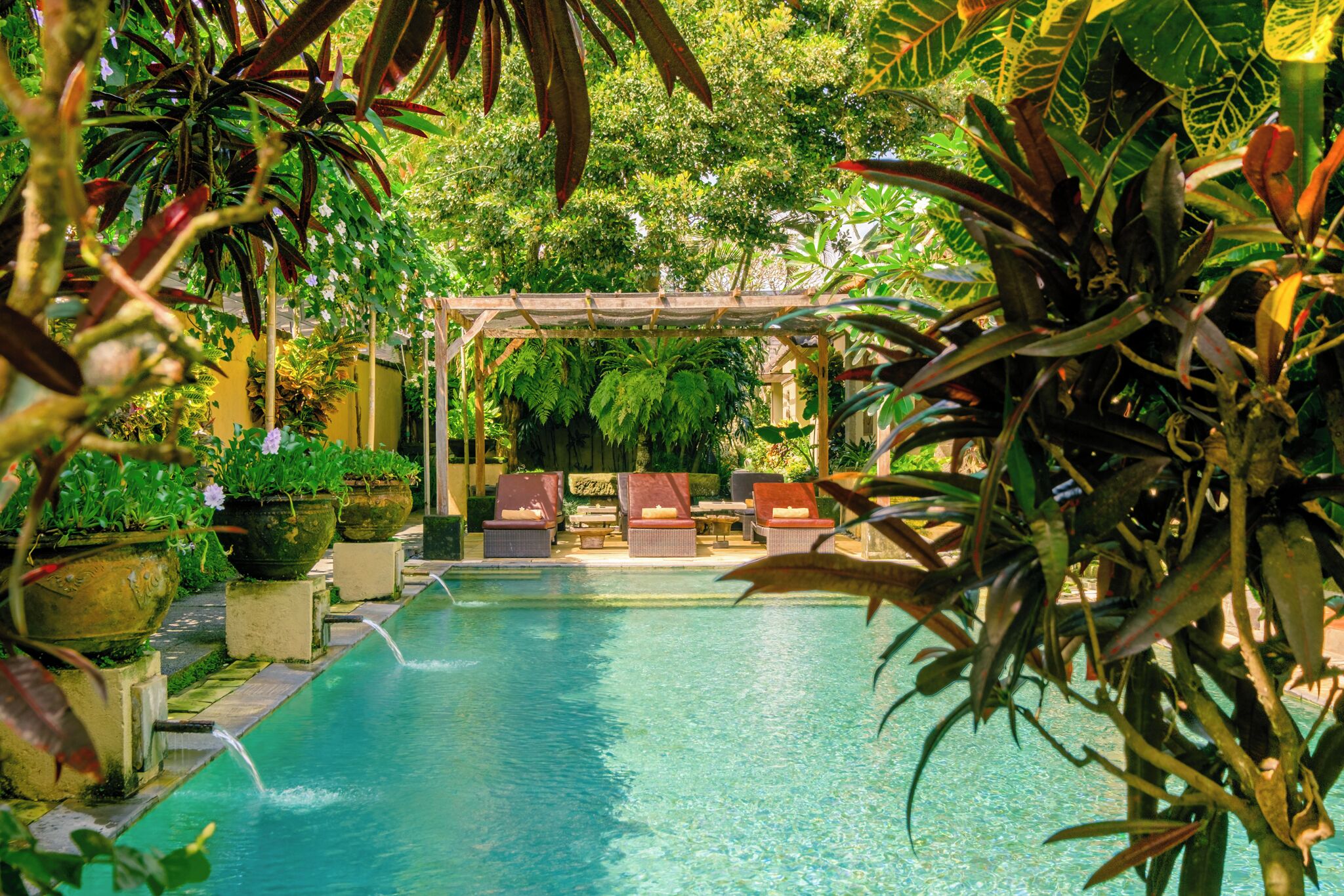 Outdoor pool, open 7:00 AM to 10:00 PM, pool umbrellas, sun loungers