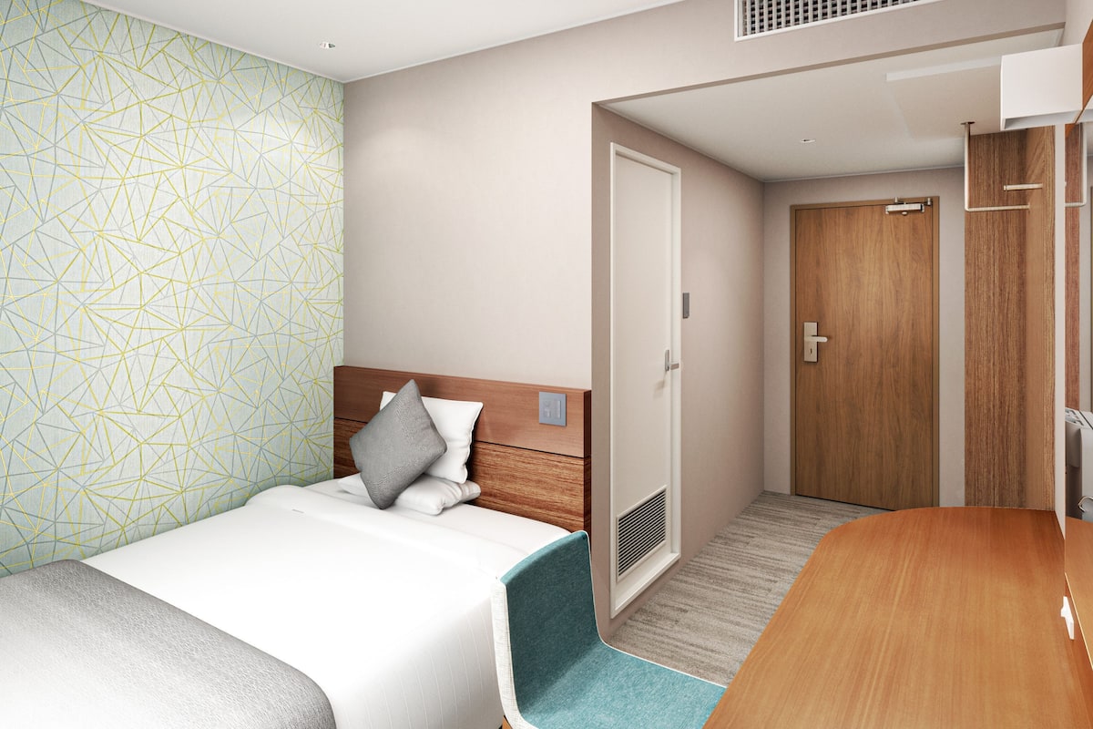Desk, blackout curtains, free WiFi, bed sheets