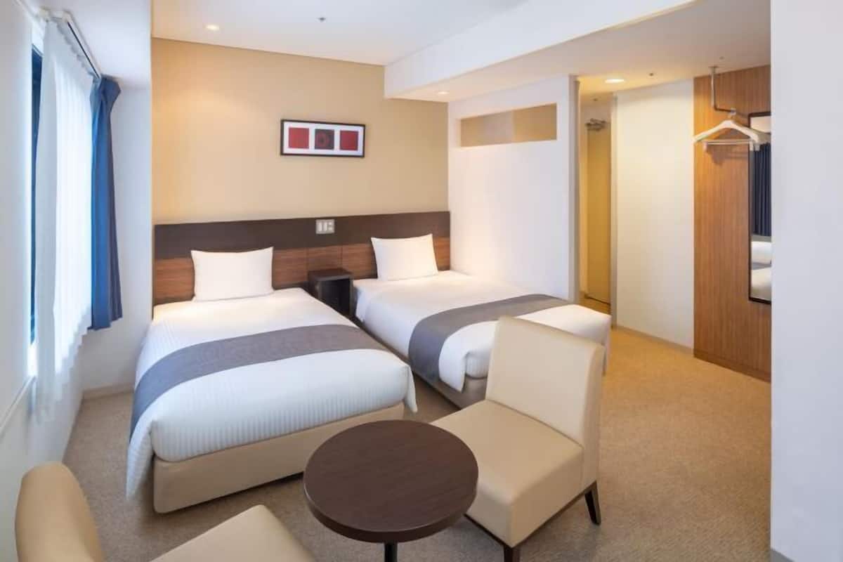 Desk, blackout curtains, free WiFi, bed sheets