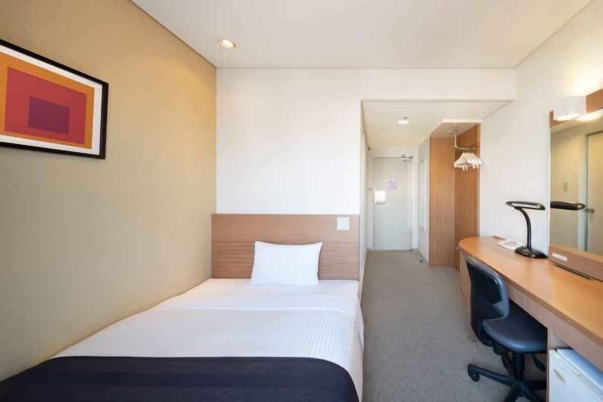 Desk, blackout curtains, free WiFi, bed sheets