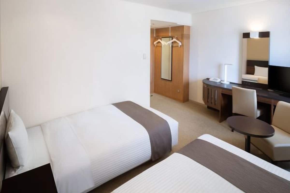 Desk, blackout curtains, free WiFi, bed sheets