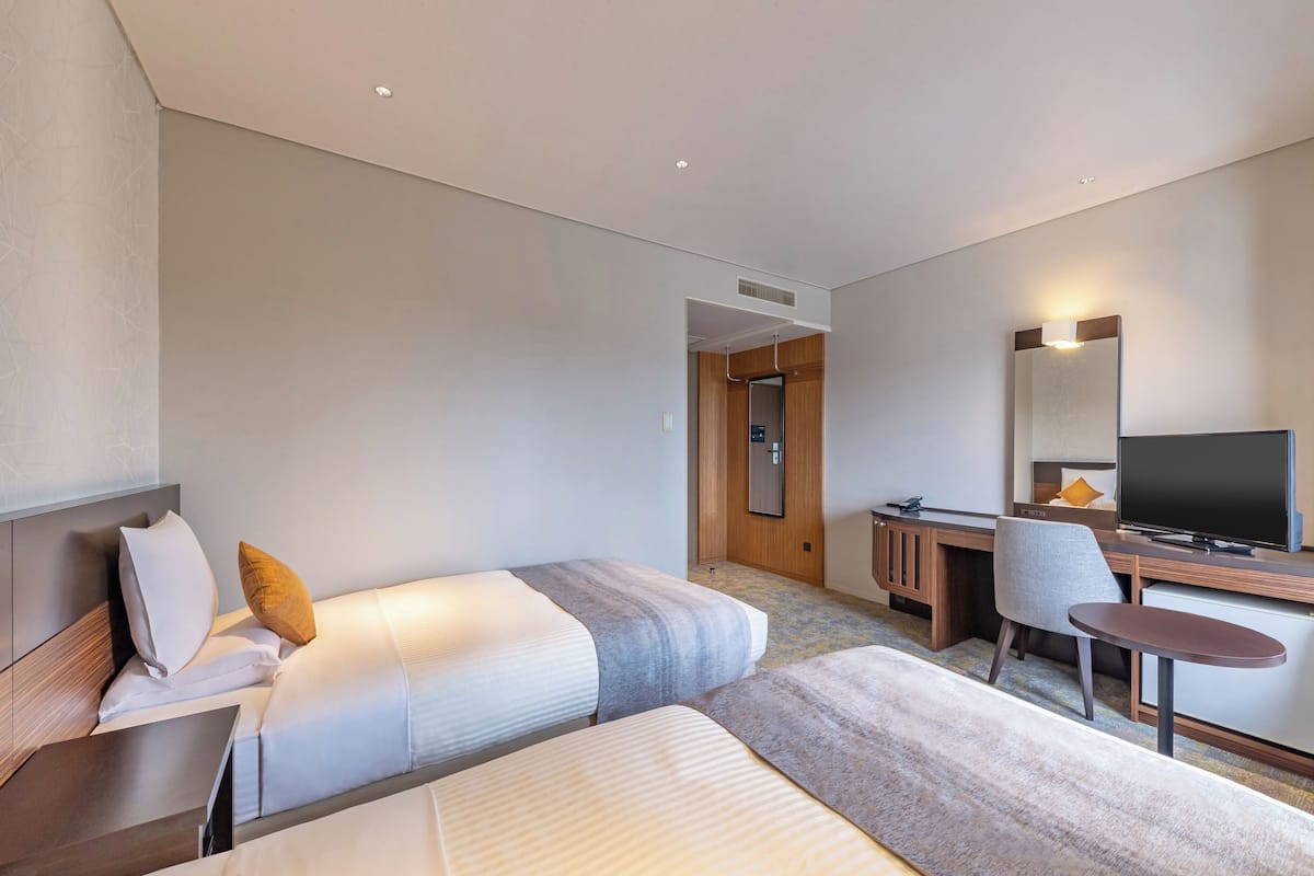 Desk, blackout curtains, free WiFi, bed sheets