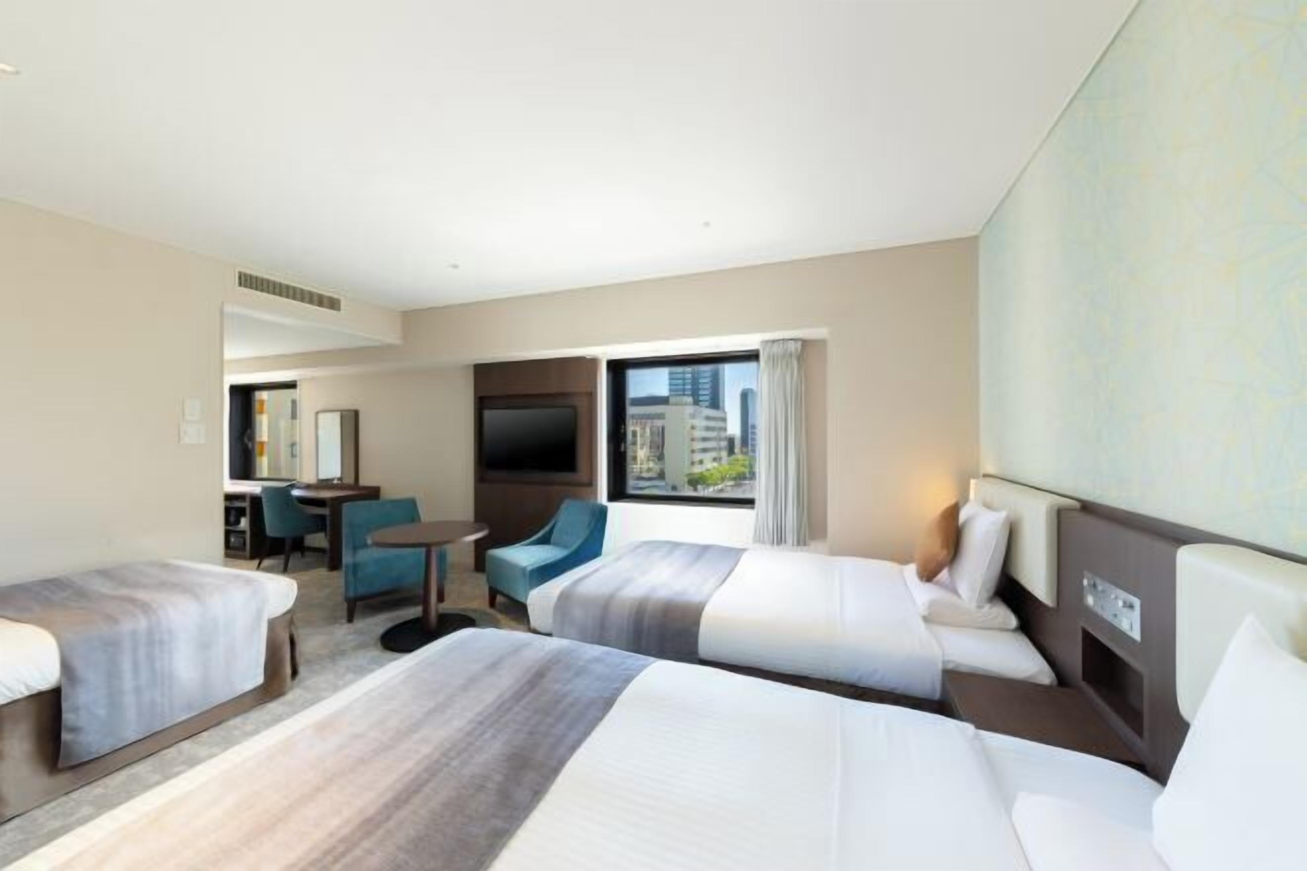 Escrivaninha, cortinas blackout, Wi-Fi de cortesia, roupa de cama