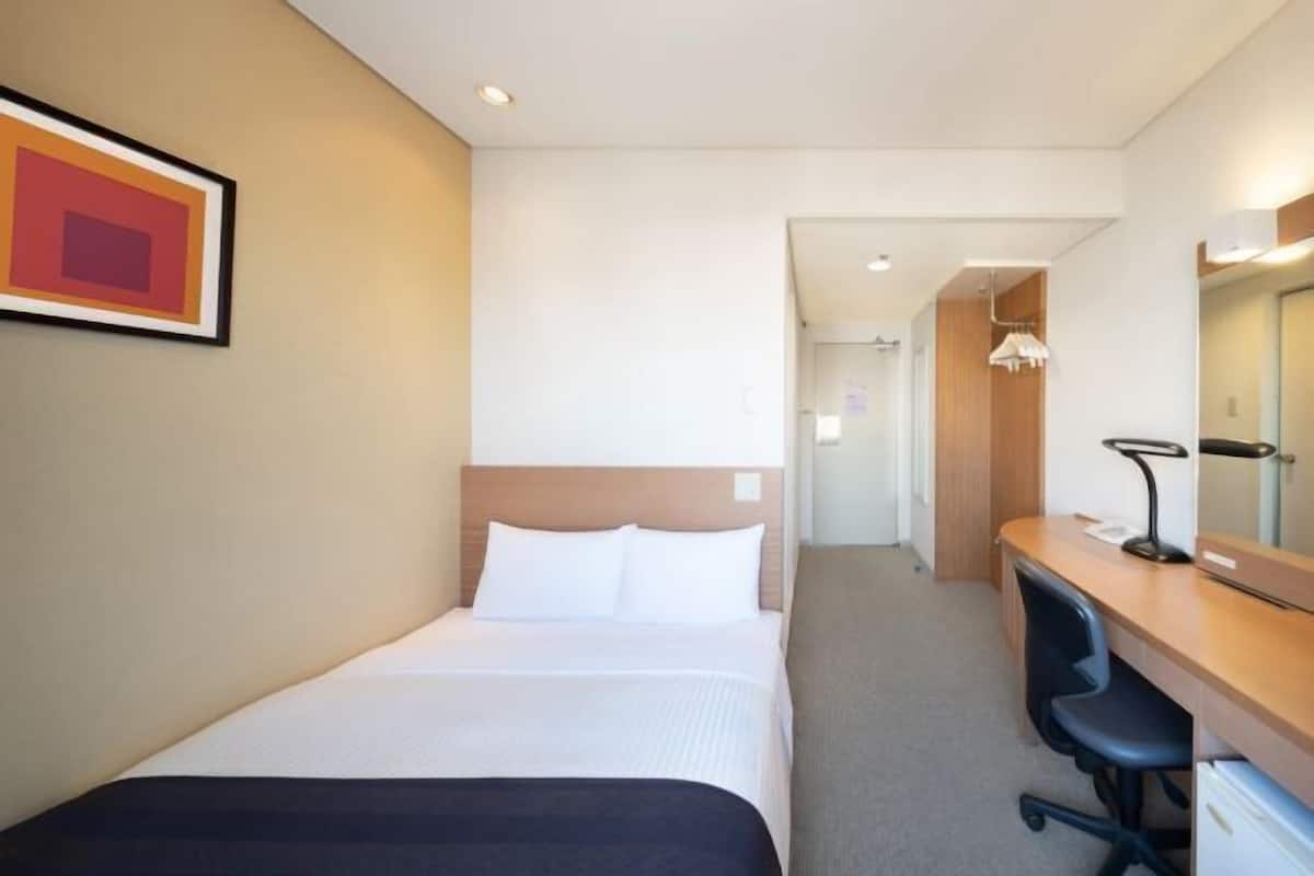 Desk, blackout curtains, free WiFi, bed sheets