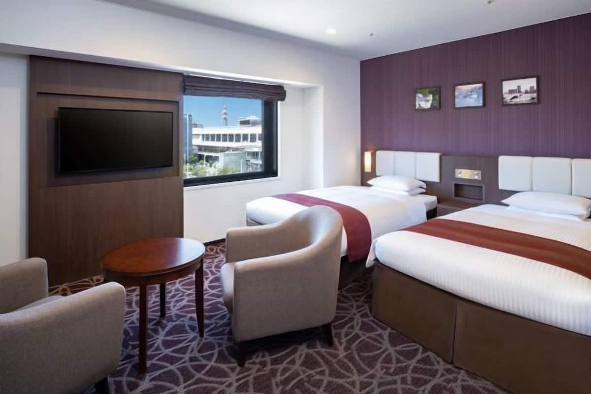 Desk, blackout curtains, free WiFi, bed sheets