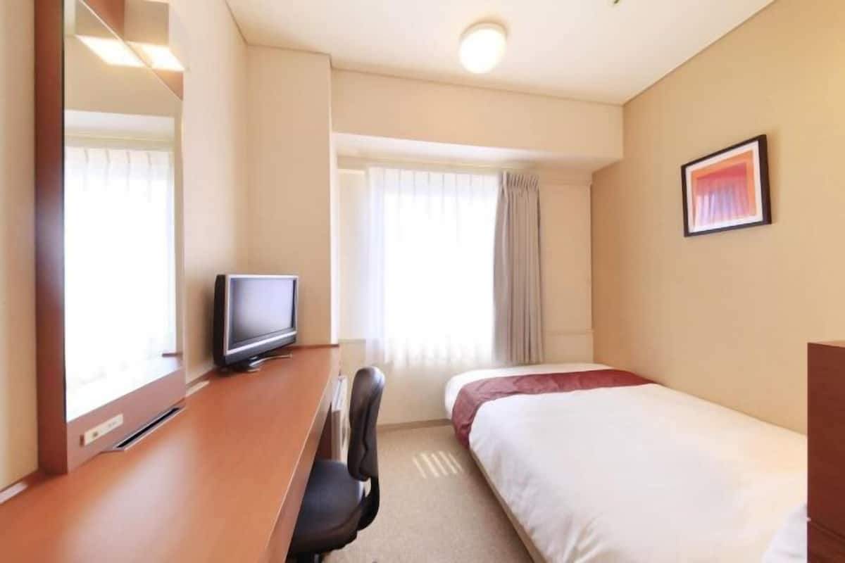 Desk, blackout curtains, free WiFi, bed sheets