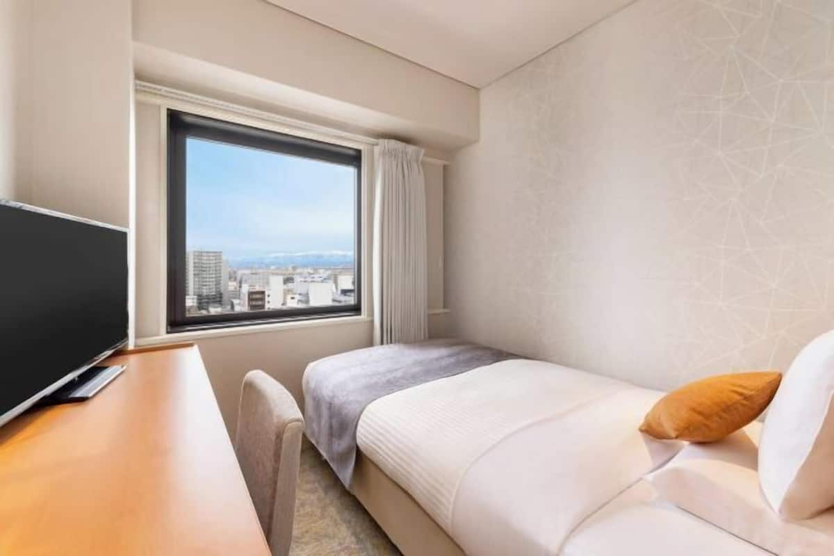 Desk, blackout curtains, free WiFi, bed sheets