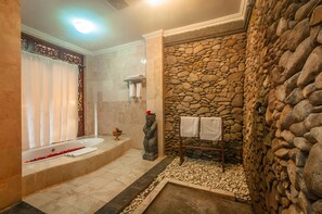 Combined shower/tub, deep soaking tub, free toiletries, hair dryer - Sahadewa Resort & Spa, Ubud (Ubud)