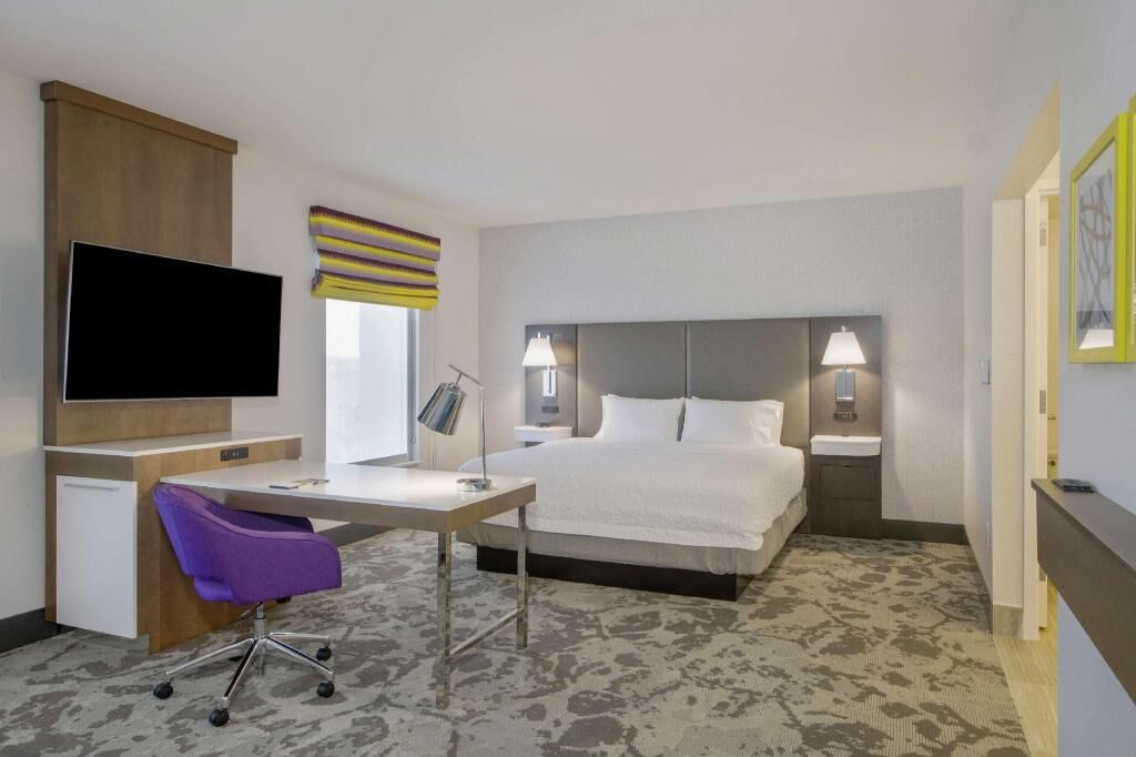 Minibar, desk, blackout drapes, iron/ironing board