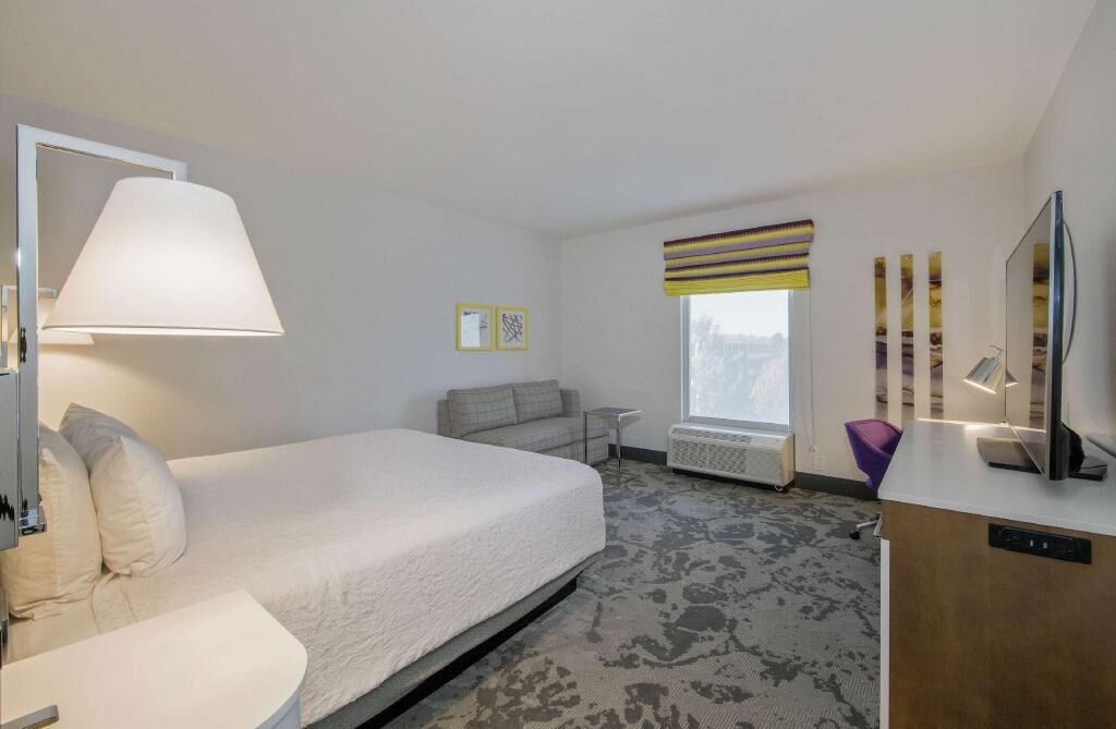 Minibar, desk, blackout drapes, iron/ironing board