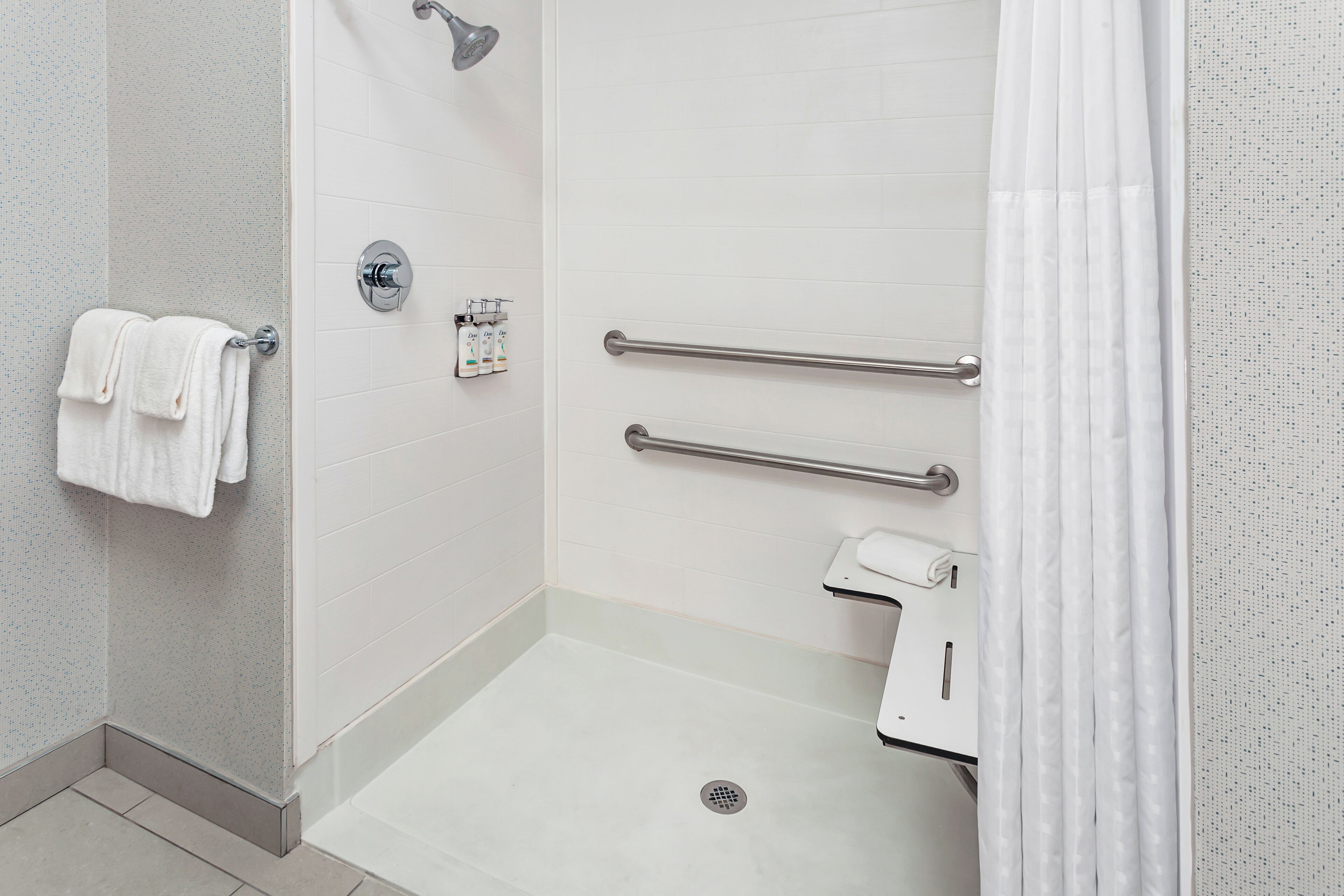 standard room, 2 queen beds, mobility accessible (roll-in shower) | bathroom | free toiletries, hair dryer, towels