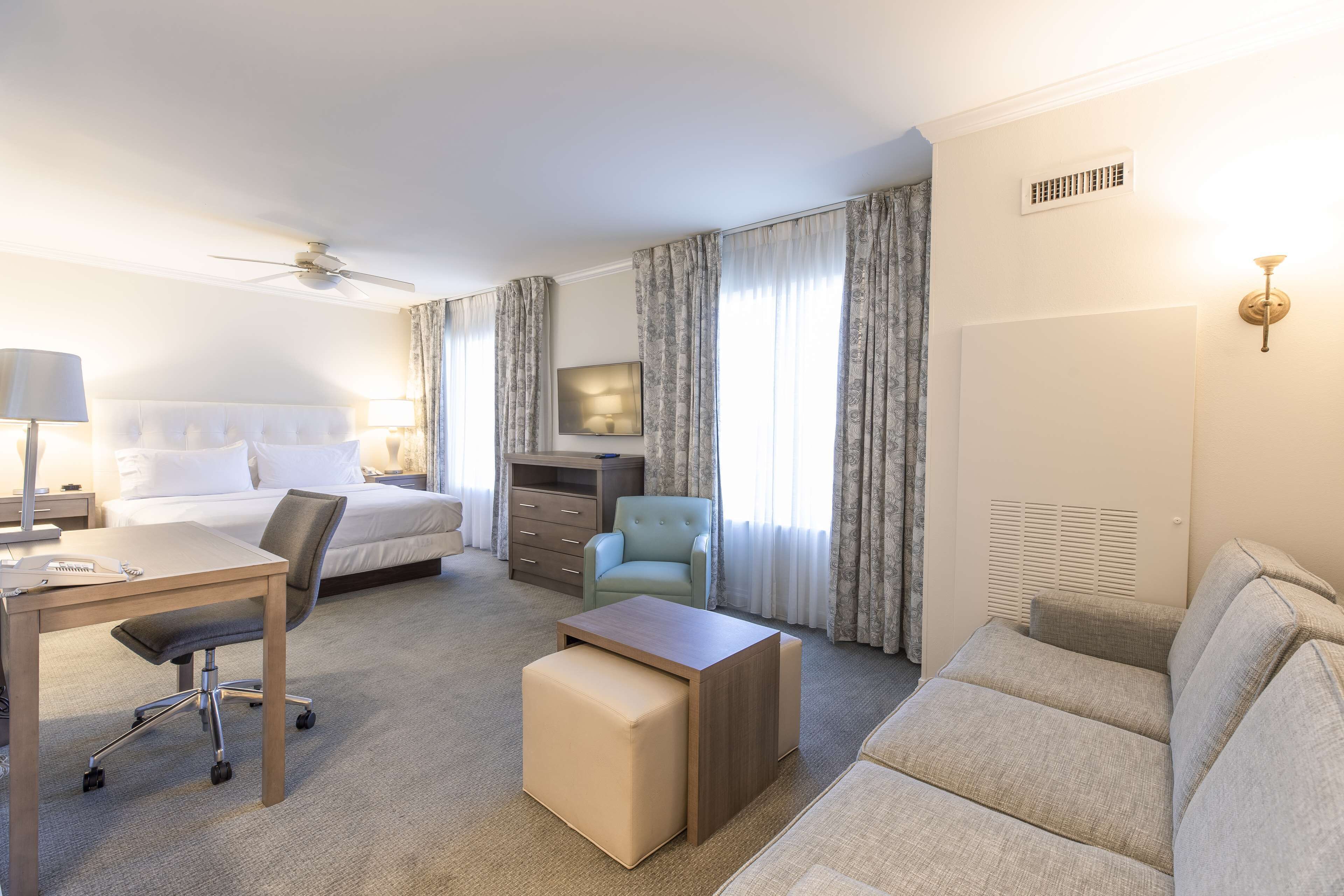 king studio suite with sleeper sofa | living area | 47-inch lcd tv with digital channels, tv, ipod dock