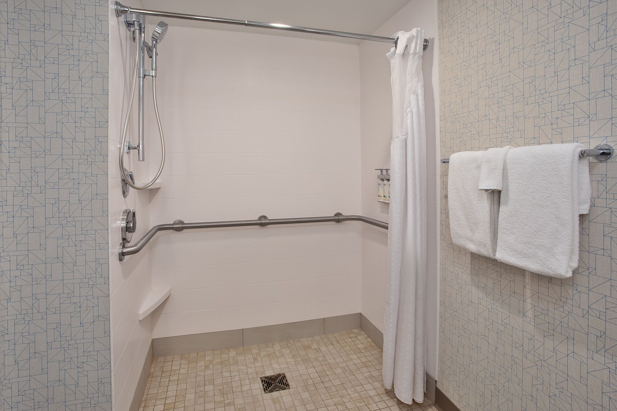 combined shower/bathtub, free toiletries, hair dryer, towels