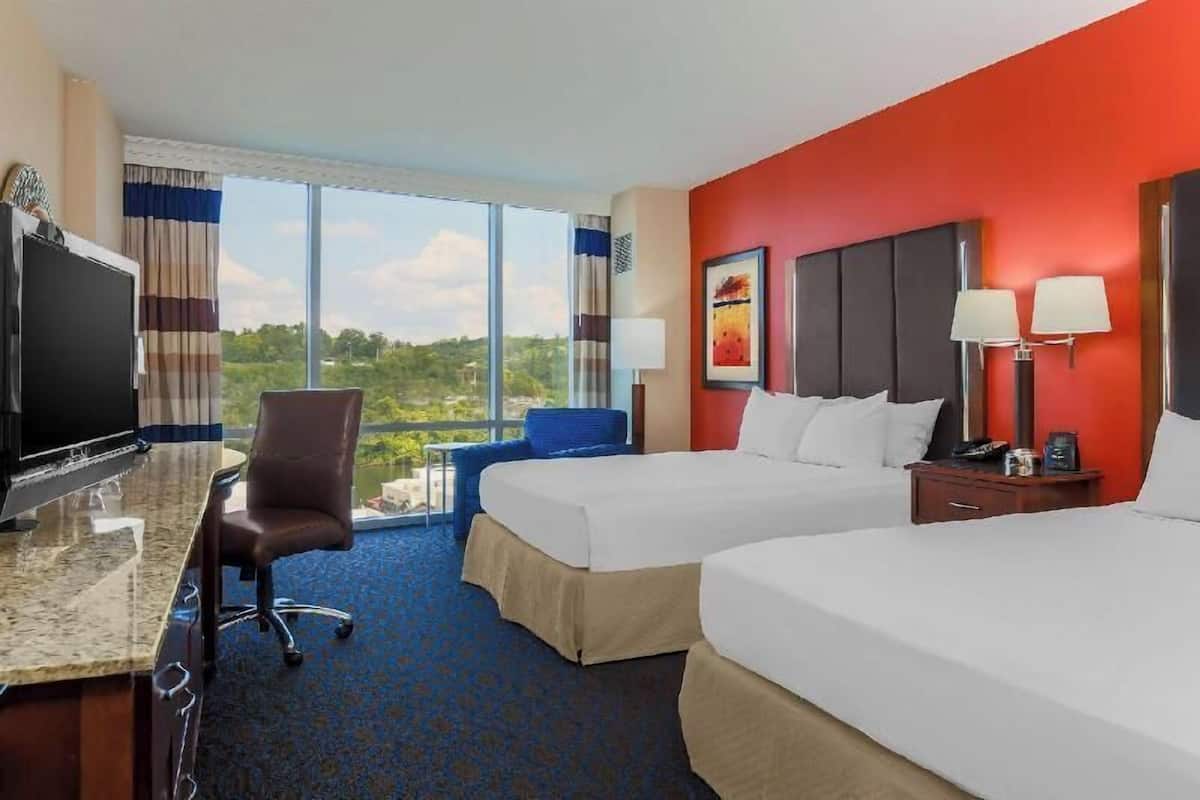 Premium bedding, down comforters, pillowtop beds, in-room safe