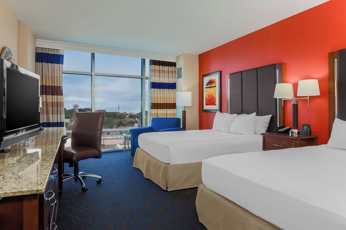 Premium bedding, down duvets, pillow-top beds, in-room safe