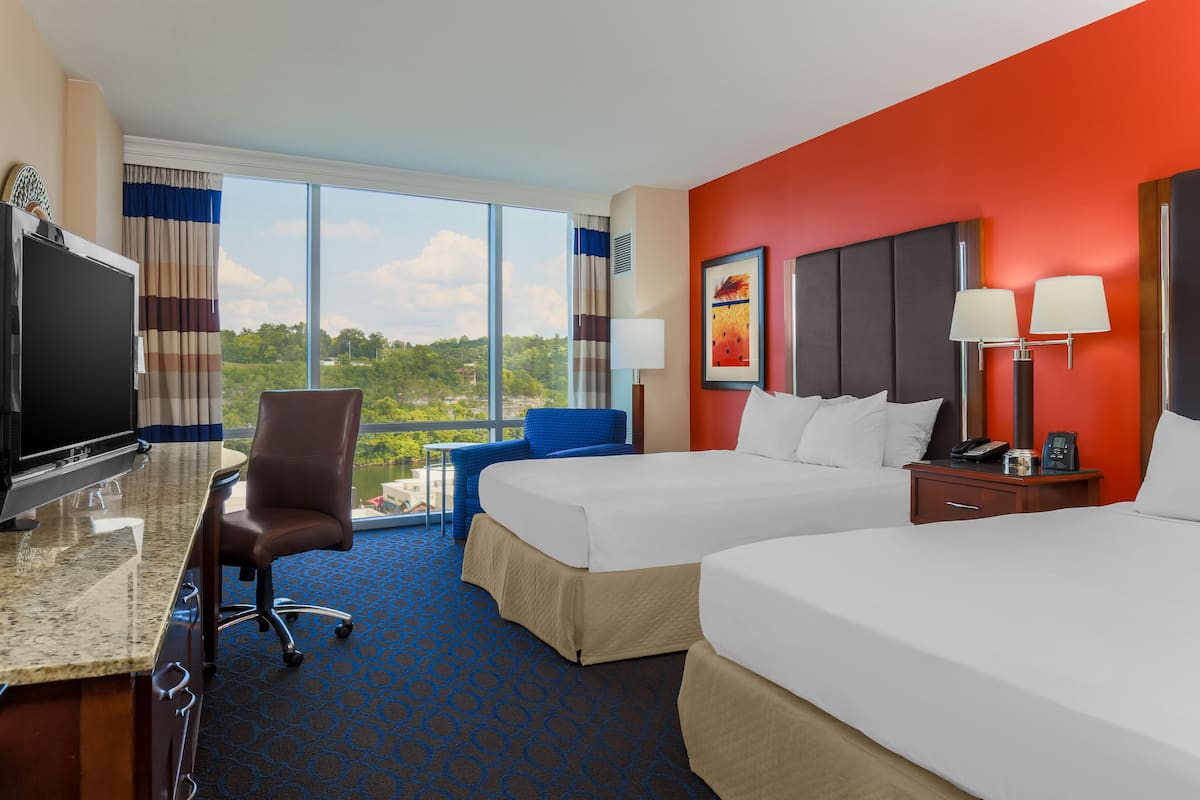 Premium bedding, down comforters, pillowtop beds, in-room safe