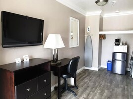 Desk, blackout drapes, soundproofing, iron/ironing board