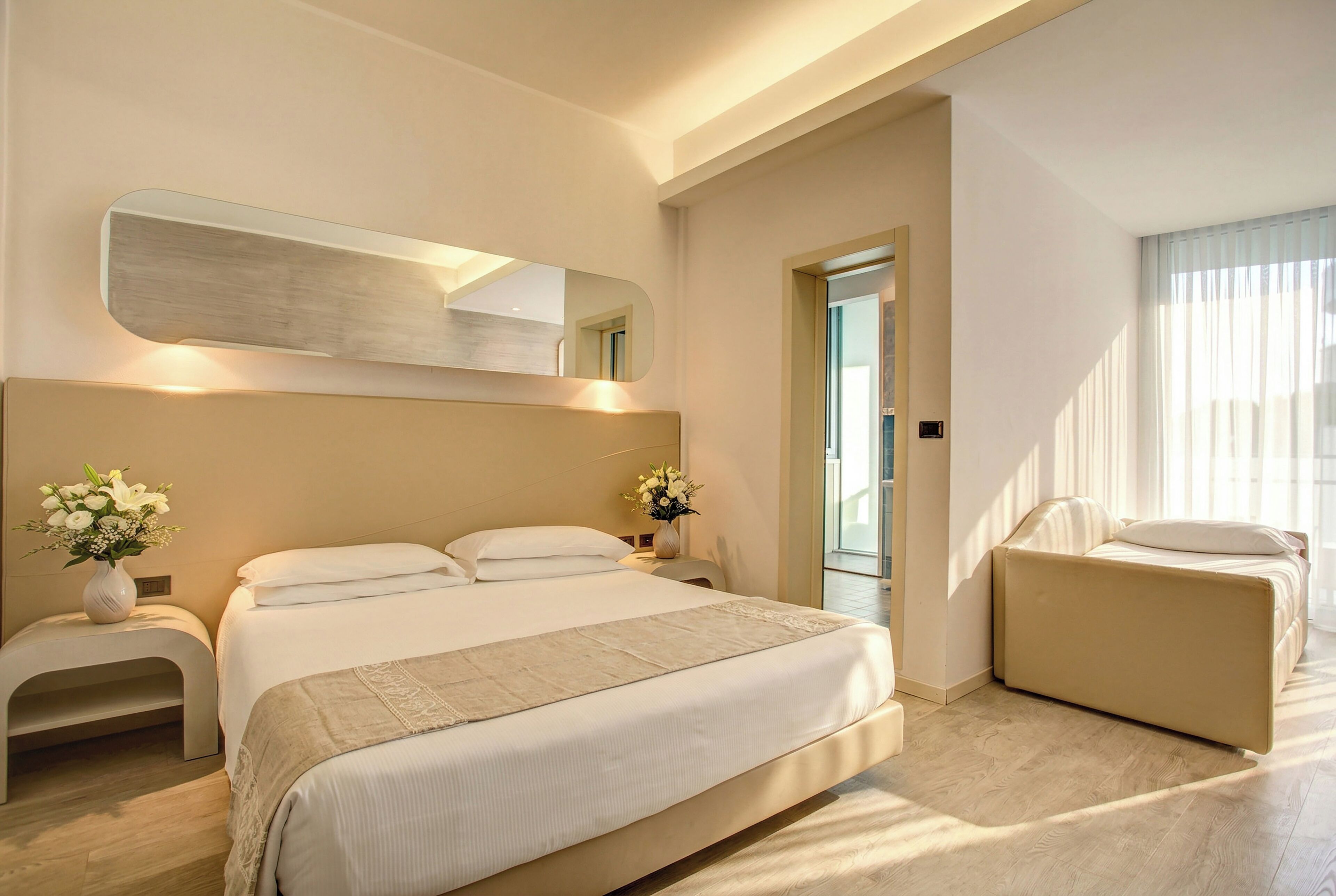 Superior Triple Room | Minibar, in-room safe, desk, blackout drapes
