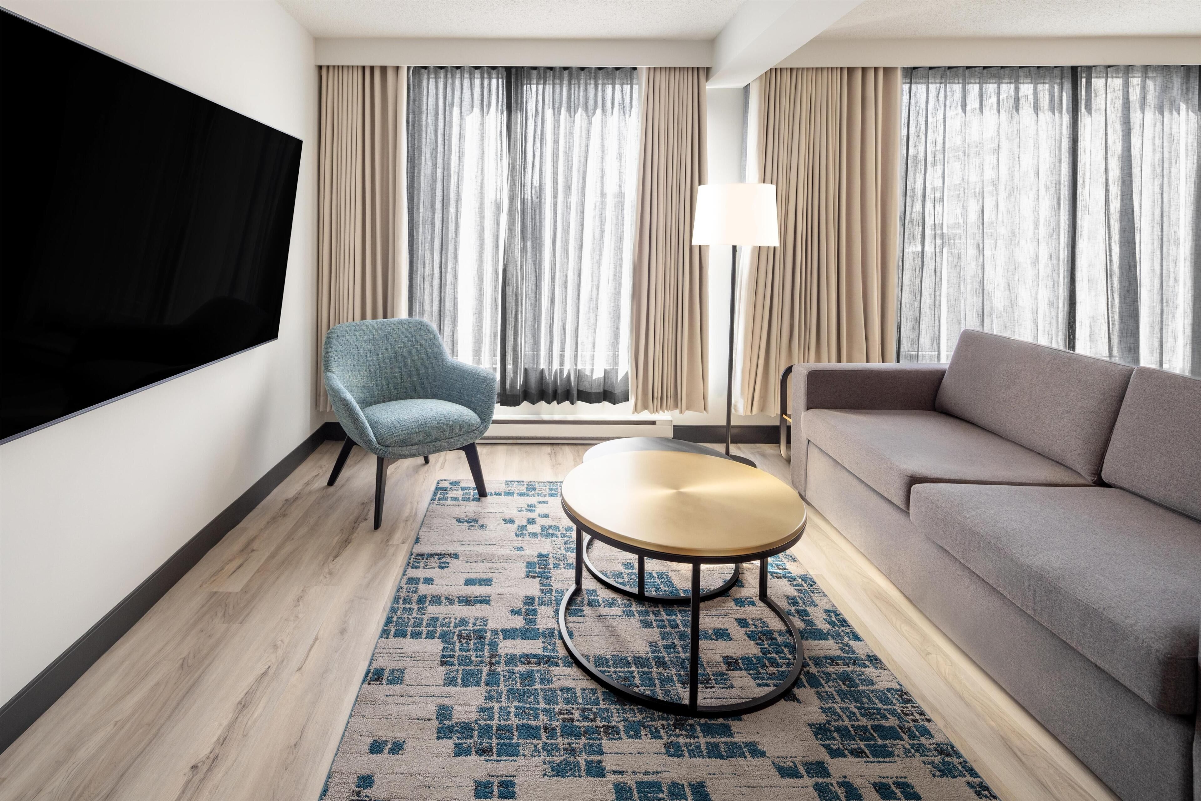 Presidential Suite, 1 Bedroom | Living area | 42-inch LCD TV with cable channels, TV, pay movies