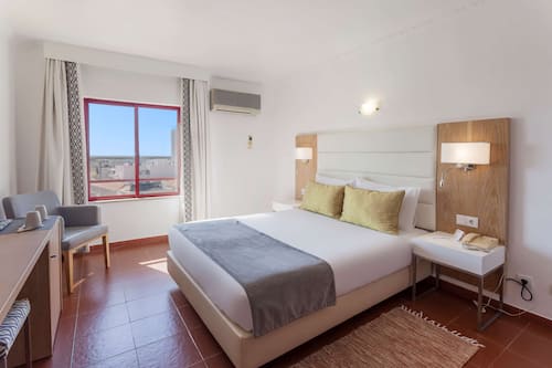 Minibar, in-room safe, desk, blackout curtains