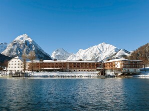 Situated by a serene lake, this hotel offers stunning views of snow-capped mountains.