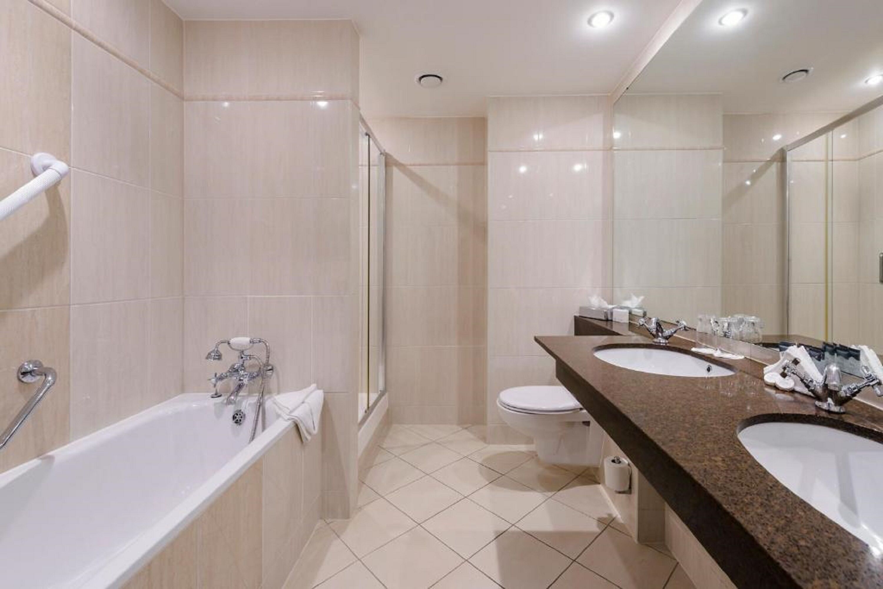 combined shower/bathtub, deep-soaking bathtub, designer toiletries