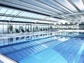 Indoor pool, open 6:00 AM to 9:30 PM, pool loungers