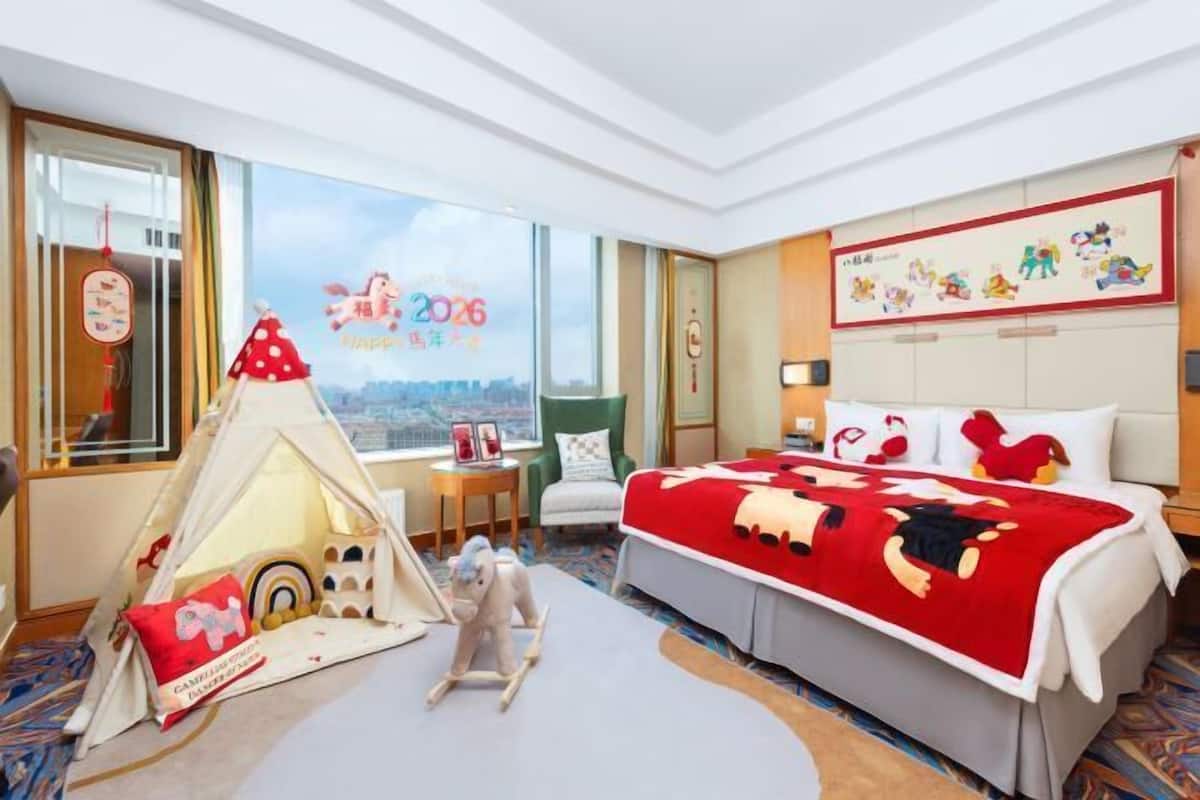 1 habitación, cubrecamas, minibar y caja de seguridad en la habitación