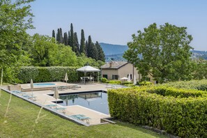 Outdoor pool, pool umbrellas, pool loungers